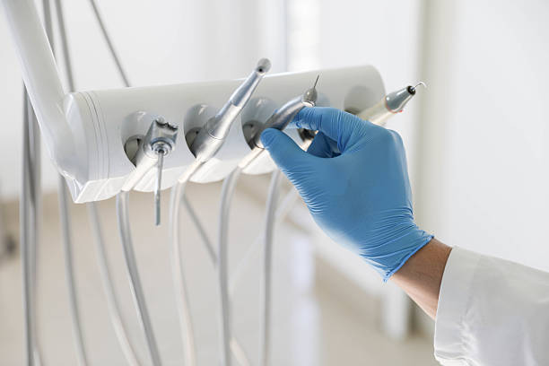 Professional Tooth Extraction technician working in Athens, GA